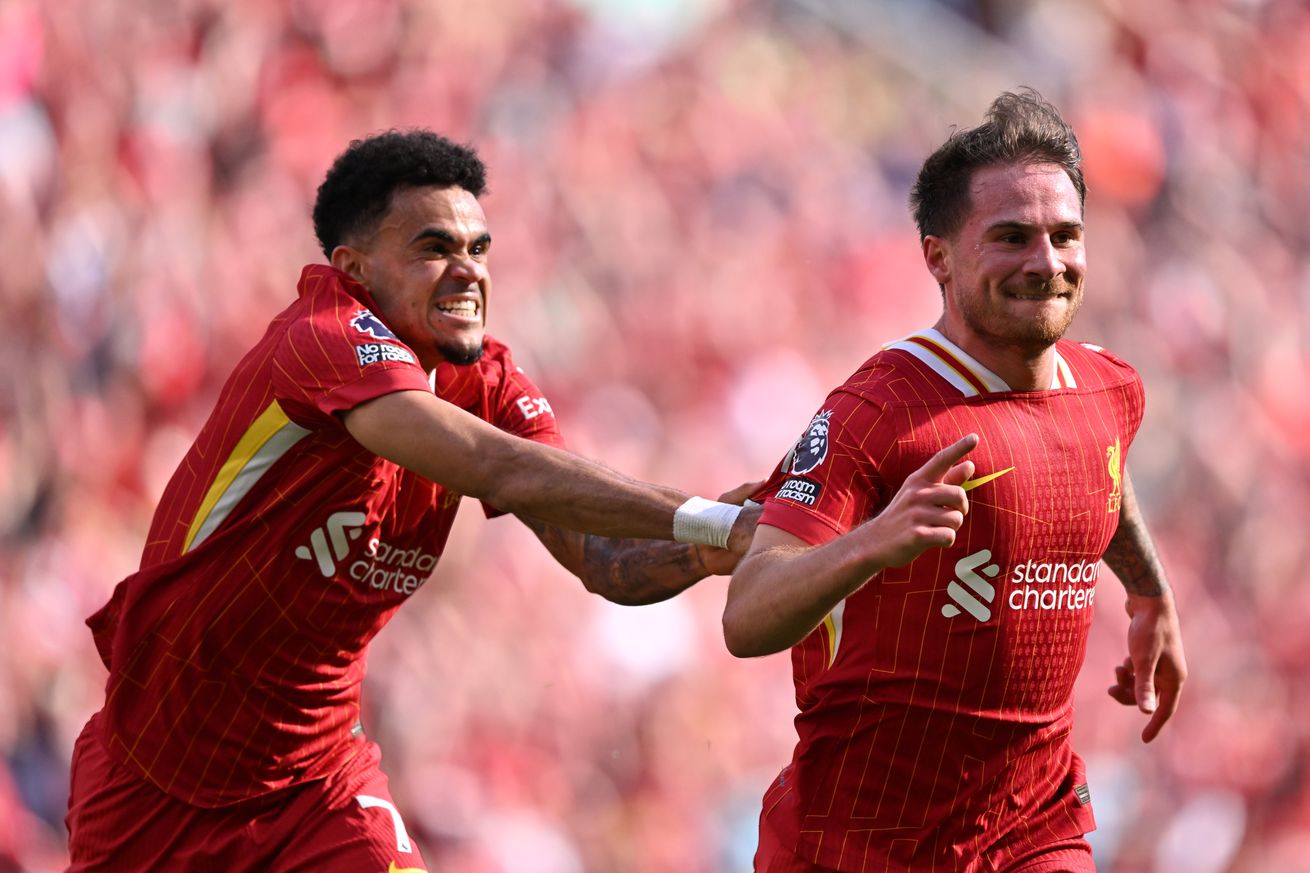 Alexis Mac Allister of Liverpool celebrates scoring his team’s second goal with teammate Luis Diaz during the Premier League match between Liverpool FC and Tottenham Hotspur FC at Anfield on April 27, 2025 in Liverpool, England.