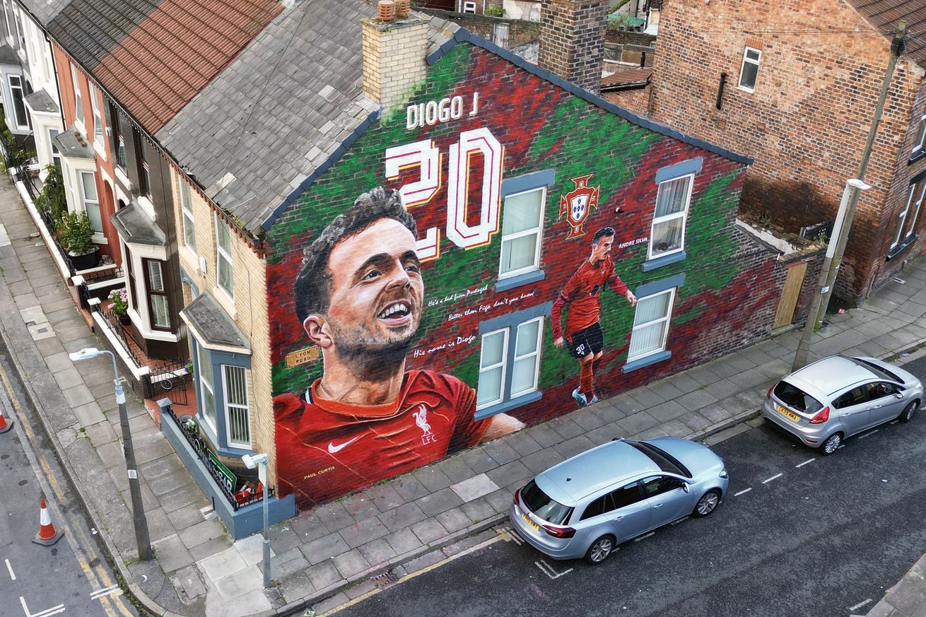 A mural of the late Portuguese Liverpool footballer Diogo Jota and his brother Andre Silva, creates by street artist Paul Curtis and paints on the facade of a house near Anfield Stadium in Liverpool, United Kingdom on 21 July 2025. Liverpool forward Diogo Jota and his brother died in a car crash in Spain on July 3, 2025, sparking widespread grief just after the Portugal star had got married.